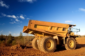 Mining truck on the red sands of Australia against a blue sky